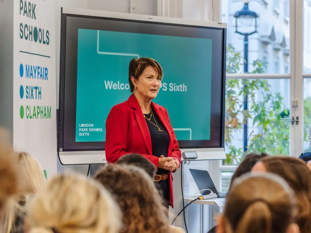 lady speaking at an open evening