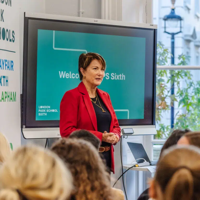 lady speaking at an open evening
